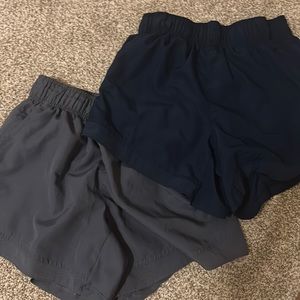 Navy and gray athletic shorts.